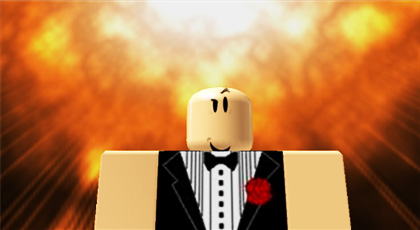 A man looking towards the camera at a low angle with a firey explosion in the background. (It's badass.)